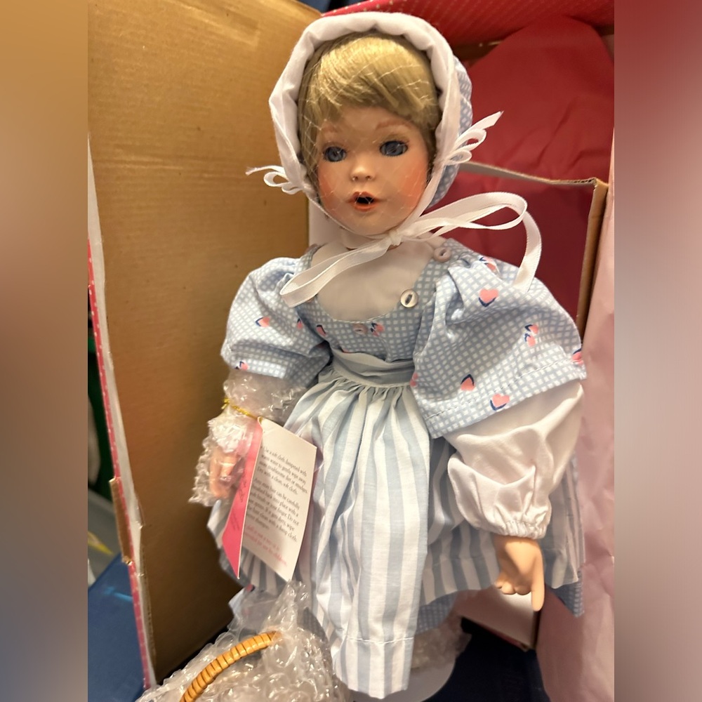 Brand new Porcelain Doll by Paradise Galleries at least 25 or 30 years old